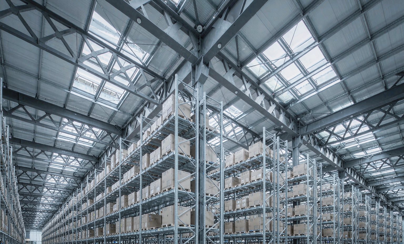 High warehouse ceiling with racking and beam smoke detection units